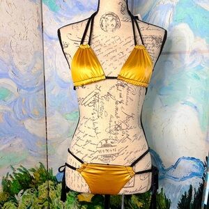 Lola love affair, gold, and black bikini.